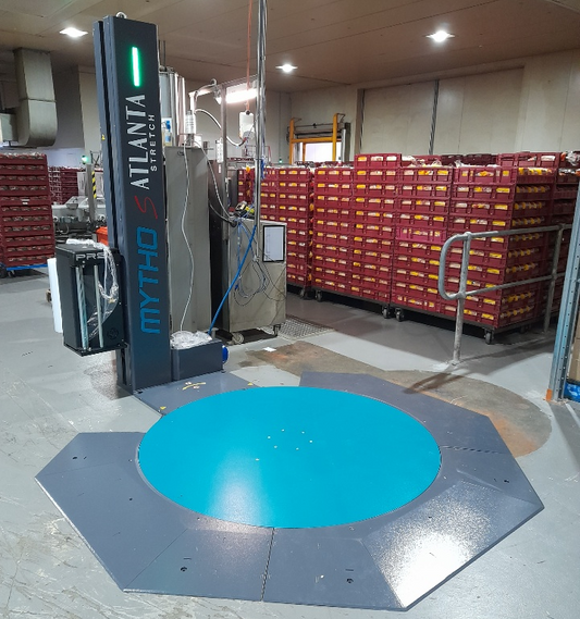 Low profile pallet wrapper for Bakery.